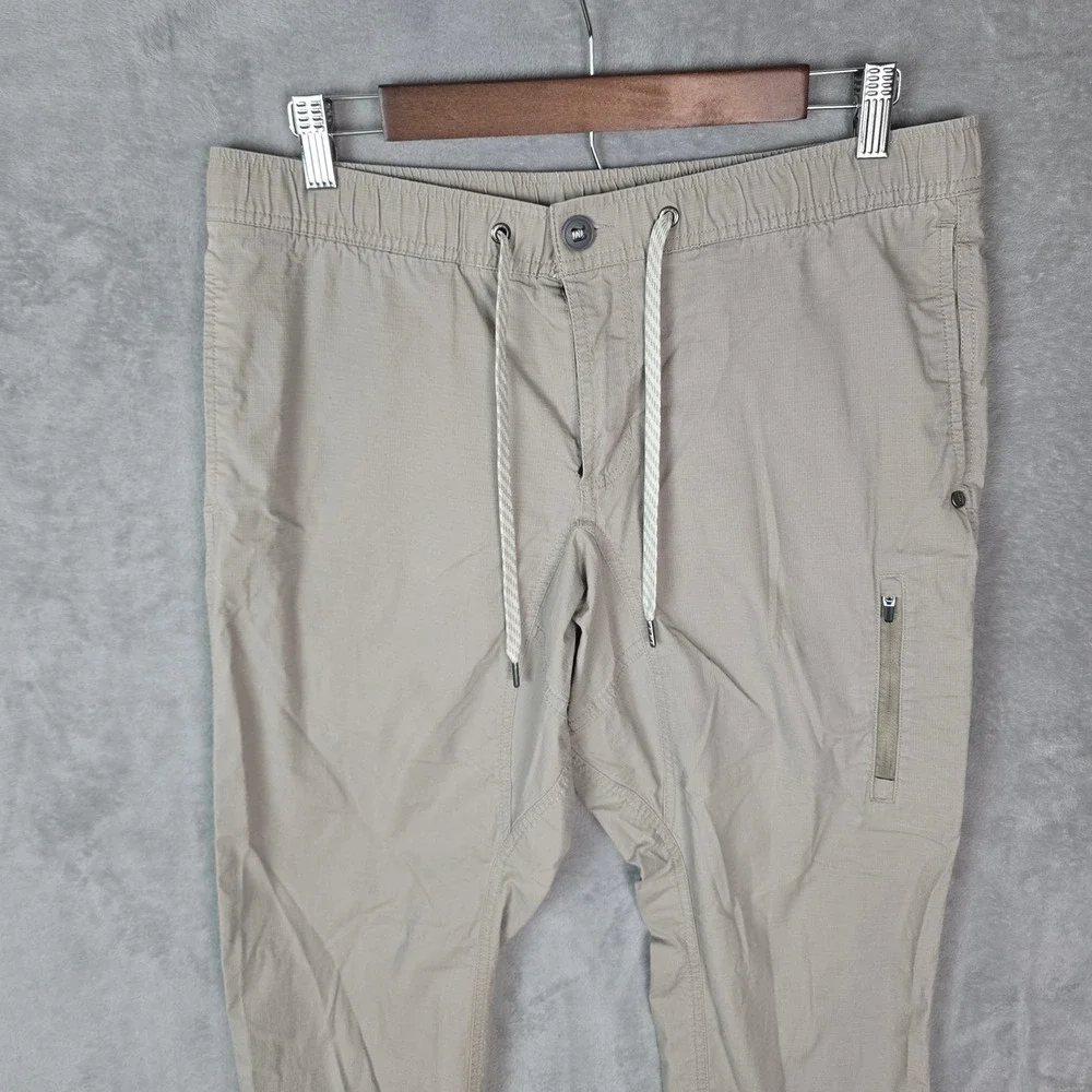 Vuori Meta Jogger Mens 34 Khaki Tan Organic Cotton Ripstop Stretch Pants Tapered